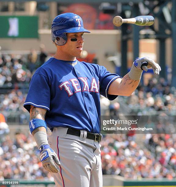 Josh Hamilton of the Texas Rangers throws his bat after striking out against the Detroit Tigers during the game at Comerica Park on April 11, 2009 in...