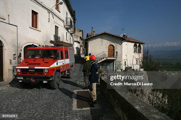 Italian Fire fighters check the damage following the April 6th earthquake on April 11, 2009 in Fossa, a village near L'Aquila, Italy. Easter weekend...