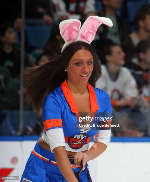 An ice girl sports bunny ears in honor of Easter during the game between the Philadelphia Flyers and the New York Islanders on April 11, 2009 at the...