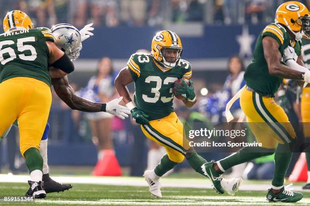 Green Bay Packers running back Aaron Jones rushes during the football game between the Green Bay Packers and Dallas Cowboys on October 8, 2017 at...