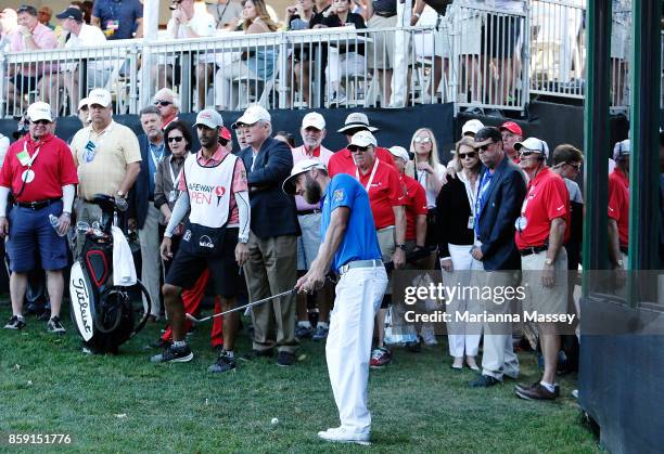 Graham DeLaet of Canada prepares to play his shot from out of bounds on the 18th hole during the final round of the Safeway Open at the North Course...