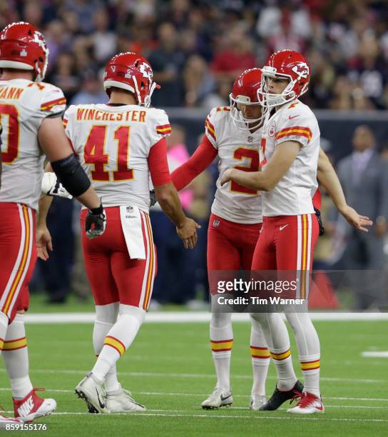 Harrison Butker of the Kansas City Chiefs celebrates a field goal with his teammates in the secound quarter against the Houston Texans at NRG Stadium...