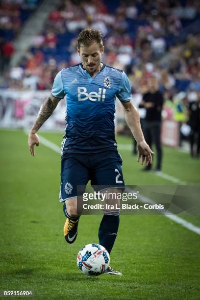 Jordan Harvey of Vancouver Whitecaps FC takes the ball up to the goal during the MLS match between New York Red Bulls and Vancouver Whitecaps FC at...