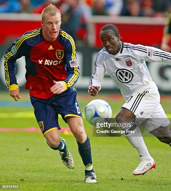 Nat Boirchers of Real Salt Lake chases Francis Dope of D.C. United during the second half of MLS action at Rio Tinto Stadium April 11, 2009 in Sandy,...