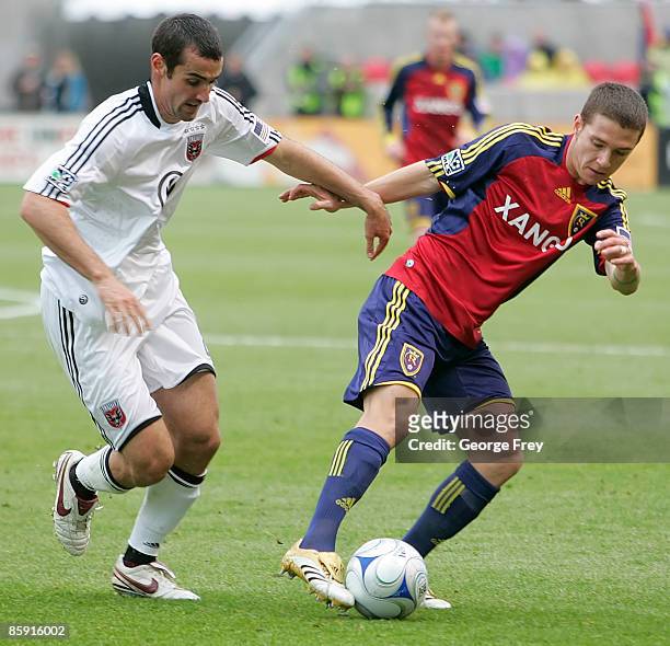 Will Johnson of Real Salt Lake fights for thje ball with Andrew Jacobson of D.C. United during the second half of MLS action at Rio Tinto Stadium...