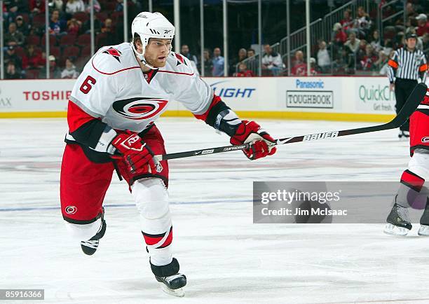 Tim Gleason of the Carolina Hurricanes skates against the New Jersey Devils at the Prudential Center on April 11, 2009 in Newark, New Jersey. The...