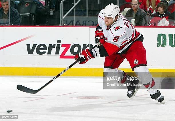 Tim Gleason of the Carolina Hurricanes skates against the New Jersey Devils at the Prudential Center on April 11, 2009 in Newark, New Jersey. The...