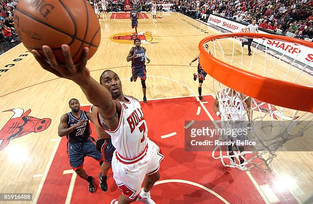 Ben Gordon of the Chicago Bulls goes to the basket past Raymond Felton of the Charlotte Bobcats during the NBA game on April 11, 2009 at the United...