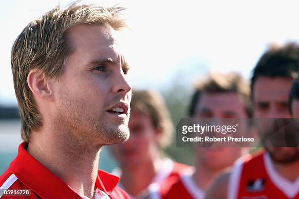 Coach David Teague of the Bullants talks to his players during the round one VFL match between the Northern Bullants and the Bendigo Bombers at Visy...