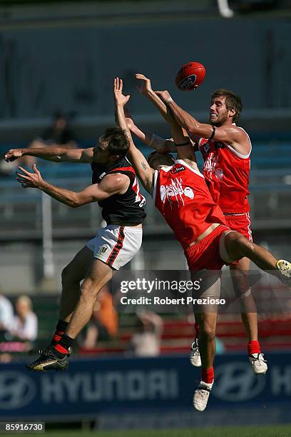 Players fly for the ball during the round one VFL match between the Northern Bullants and the Bendigo Bombers at Visy Park on April 12, 2009 in...