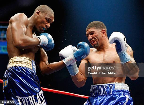 Paul Williams and Winky Wright trade blows in the fourth round of their middleweight bout at the Mandalay Bay Events Center April 11, 2009 in Las...