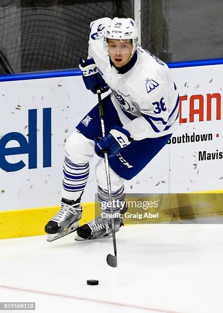 Austin Osmanski of the Mississauga Steelheads turns up ice against the Sudbury Wolves during game action on October 6, 2017 at Hershey Centre in...