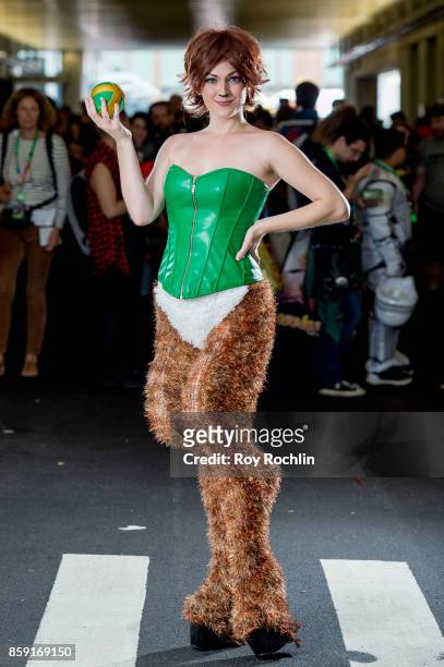 Fan cosplays as Elora from Spyro the Dragon during the 2017 New York Comic Con - Day 4 on October 8, 2017 in New York City.