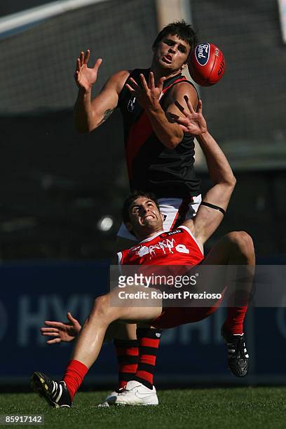 Jay Neagle of the Bombers attempts to mark in front of a Bullants player during the round one VFL match between the Northern Bullants and the Bendigo...