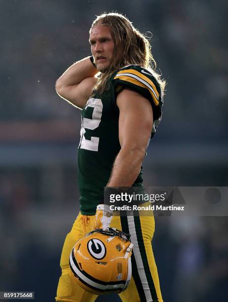 Clay Matthews of the Green Bay Packers walks to the field in the fourth quarter of play against the Dallas Cowboys at AT&T Stadium on October 8, 2017...