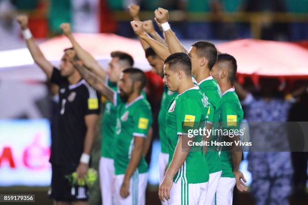 Javier Hernandez of Mexico observes one minute of silence in honor of Mexico erathquake victims prior to the match between Mexico and Trinidad &...