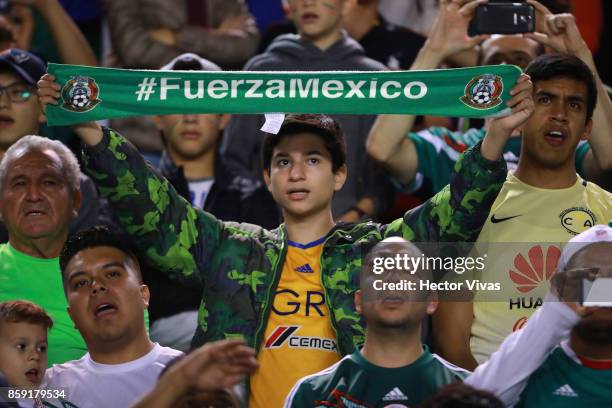 Fans of Mexico cheer their team prior to the match between Mexico and Trinidad & Tobago as part of the FIFA 2018 World Cup Qualifiers at Alfonso...