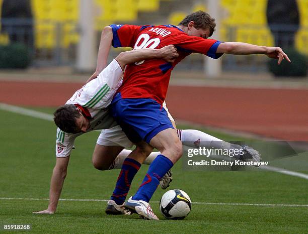 Tomas Necid of PFC CSKA Moscow battles for the ball with Jan Durica of FC Lokomotiv Moscow during the Russian Football League Championship match...
