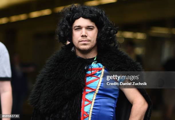 Comic Con cosplayer dressed as Jon Snow meets Snow White poses during the 2017 New York Comic Con - Day 4 on October 8, 2017 in New York City.