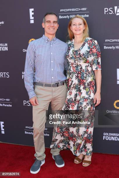 Los Angeles Mayor Eric Garcetti and Amy Wakeland attend P.S. ARTS' Express Yourself 2017 event at Barker Hangar on October 8, 2017 in Santa Monica,...