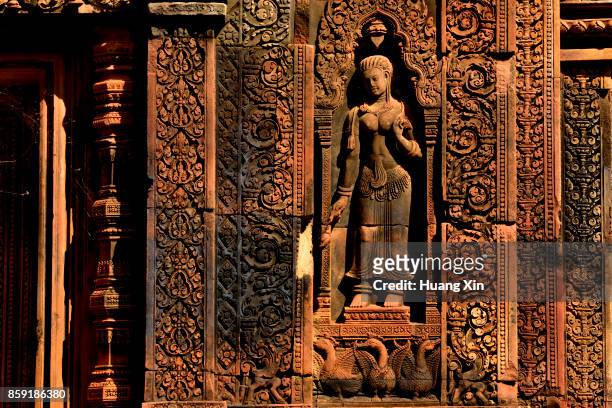 the god of citadel of women statue at banteay srei temple at angkor - banteay srei bildbanksfoton och bilder