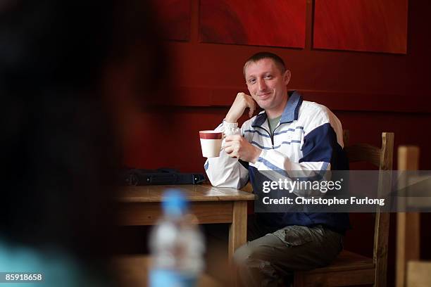 Cafe life customer Andy Hurley, who claims to be cured of his deafness after a miracle by Cafe Life manager Aliss Cresswell healed him, April 12,...