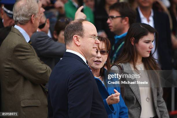 Prince Albert II of Monaco talks with Mme Elisabeth- Anne de Massy before an exhibition tennis match between Rafael Nadal of Spain and Andy Murray of...