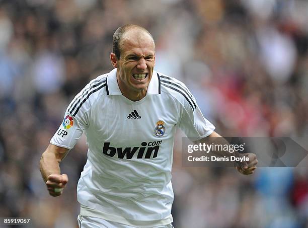 Arjen Robben of Real Madrid celebrates after scoring Real's second goal during the La Liga match between Real Madrid and Valladolid at the Santiago...