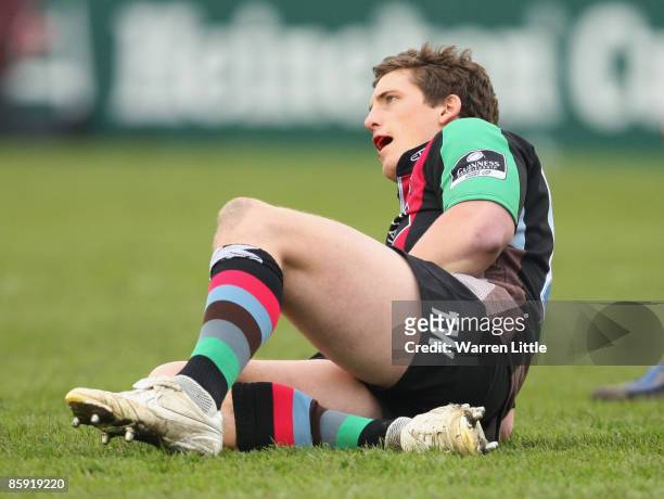 Tom Williams of Harlequins goes to ground as blood pours from his mouth during the Heineken Cup Quarter Final match between Harlequins and Leinster...