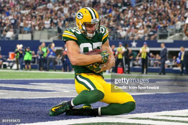 Green Bay Packers wide receiver Jordy Nelson cradles a touchdown reception during the football game between the Green Bay Packers and Dallas Cowboys...