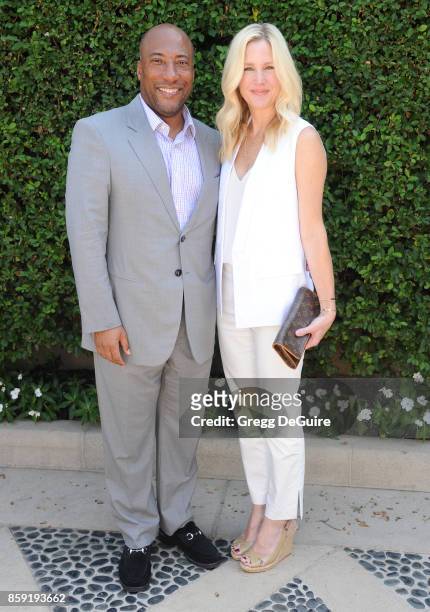 Byron Allen and Jennifer Lucas arrive at The Rape Foundation's Annual Brunch at a private residence on October 8, 2017 in Los Angeles, California.