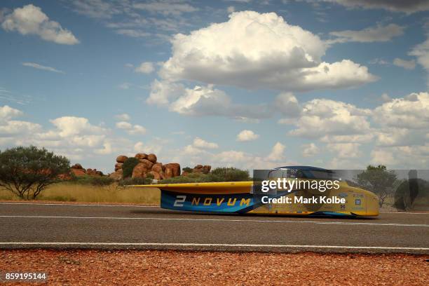 Graduated] color filter was used for this image.) University of Michigan Solar Car Team vehicle "Novum" from the United States of America races races...