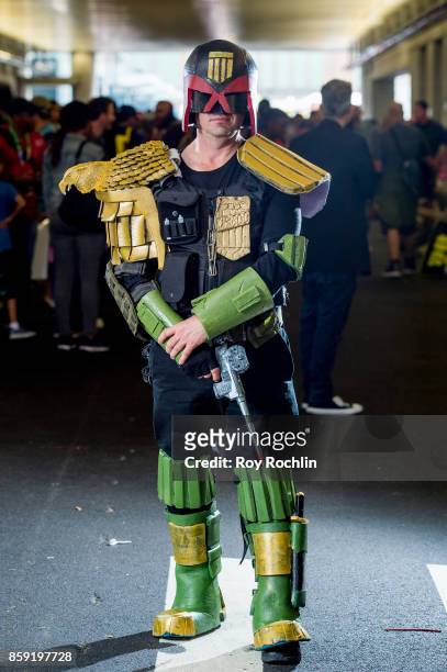 Fan cosplays as Judge Dredd during the 2017 New York Comic Con - Day 4 on October 8, 2017 in New York City.