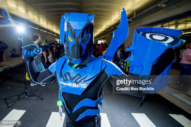 Fan cosplays as Blue Beetle during the 2017 New York Comic Con - Day 4 on October 8, 2017 in New York City.