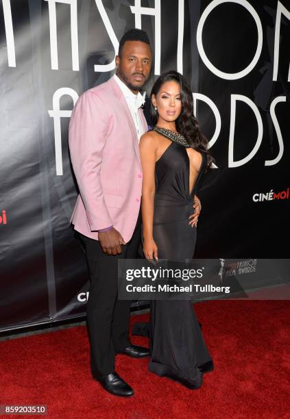 James Anderson and model Carissa Rosario attend the 4th Annual CineFashion Film Awards at El Capitan Theatre on October 8, 2017 in Los Angeles,...