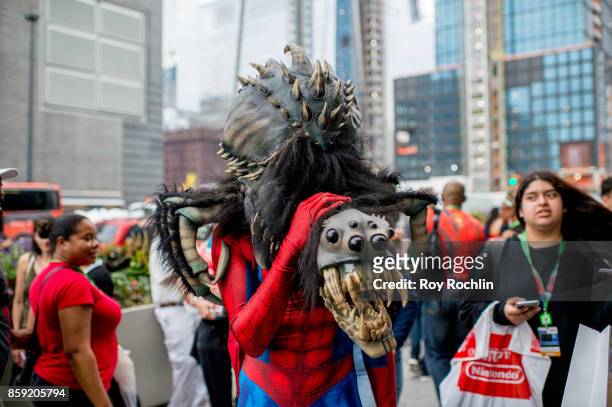 Fan cosplays as Spider-Man during the 2017 New York Comic Con - Day 4 on October 8, 2017 in New York City.