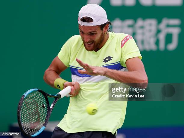 Joao Sousa of Portugal hits a forehand during the Men's Singles first round match against Albert Ramos-Vinolas of Spain on day two of the 2017 ATP...