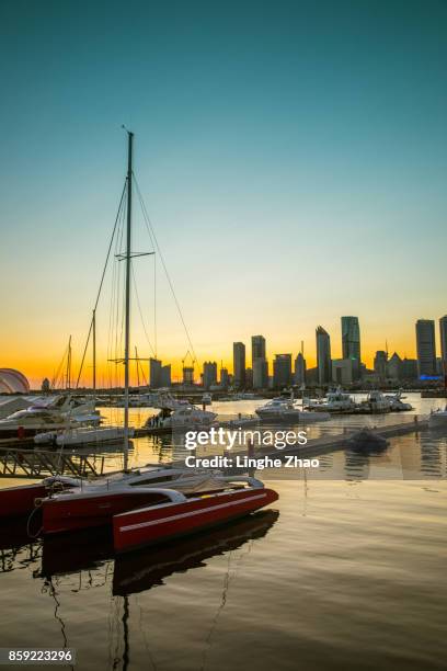 qingdao olympic sailing center at sunset,china - linghe zhao stock pictures, royalty-free photos & images