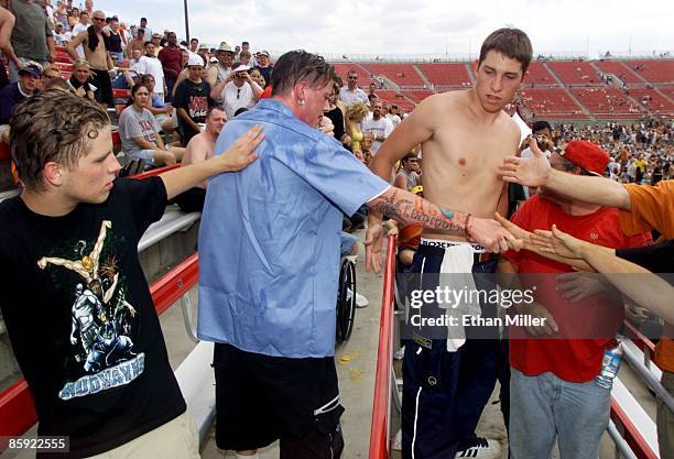 Taproot singer Stephen Richards sings while running through the stands at KXTE Xtreme Radio's "Our Big Concert 4" at Sam Boyd Stadium May 12, 2001 in...