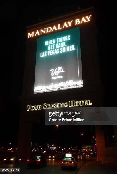 Marquee at Mandalay Bay Resort and Casino displays a message in tribute to the victims of last Sunday night's mass shooting on October 8, 2017 in Las...