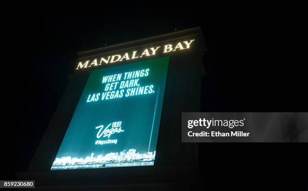 Marquee at Mandalay Bay Resort and Casino displays a message in tribute to the victims of last Sunday night's mass shooting on October 8, 2017 in Las...