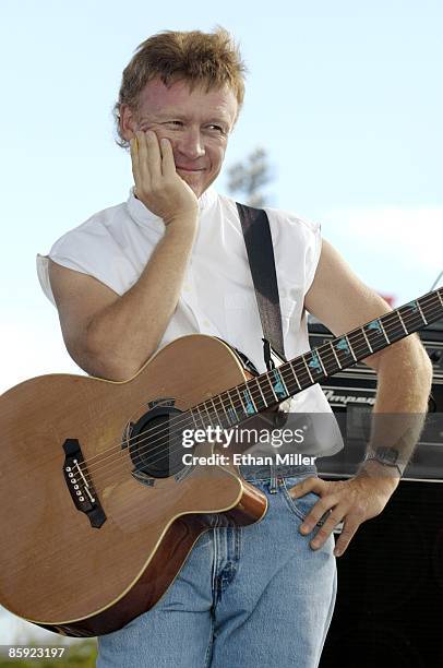 Firefall singer/guitarist Steve Weinmeister waits for another band to finish playing at Lite 100.5 FM's "Sparks in the Park: A Tribute to Americans"...