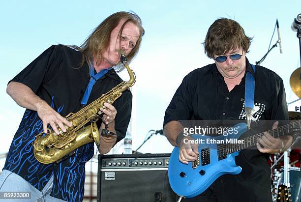 Firefall saxophonist David Muse and singer/guitarist Jock Bartley perform at Lite 100.5 FM's "Sparks in the Park: A Tribute to Americans" event at...