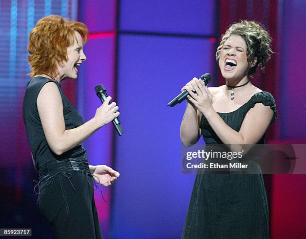 Singer Reba McEntire and American Idol winner Kelly Clarkson perform during the "American Idol in Vegas" concert at the MGM Grand Garden Arena...