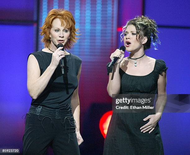 Singer Reba McEntire and American Idol winner Kelly Clarkson perform during the "American Idol in Vegas" concert at the MGM Grand Garden Arena...