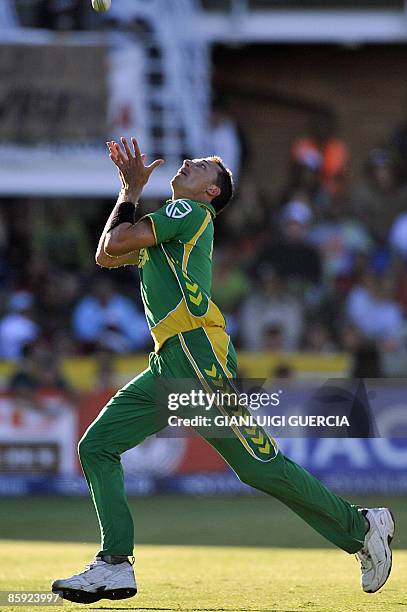 South African bowler Dale Steyn catches out Australian batsman Dave Hussey on April 13, 2009 during the One Day International cricket match between...
