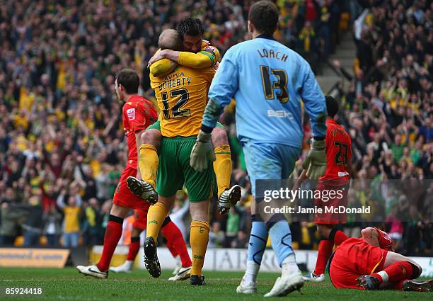 Gary Doherty of Norwich celebrates his goal with Alan Lee during the Coca Cola Championship match between Norwich City and Watford at Carrow Road on...