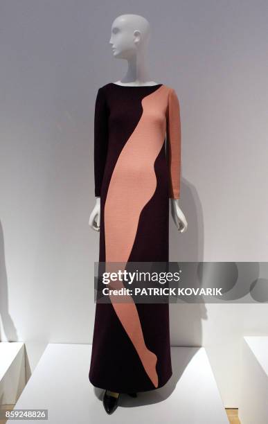 Models is displayed during an exhibition dedicated to Yves Saint-Laurent on March 8, 2010 at the Petit Palais in Paris. The world of Yves...