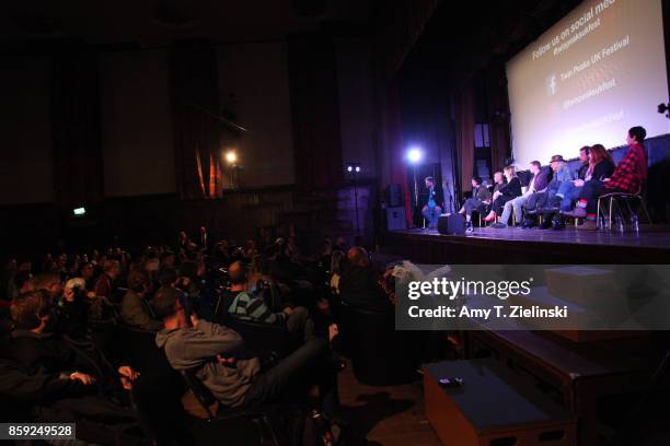 The audience watches as Author Tom Huddleston of Time Out magazine in London interviews actors Sherilyn Fenn, James Marshall, Amy Shiels, Jake...