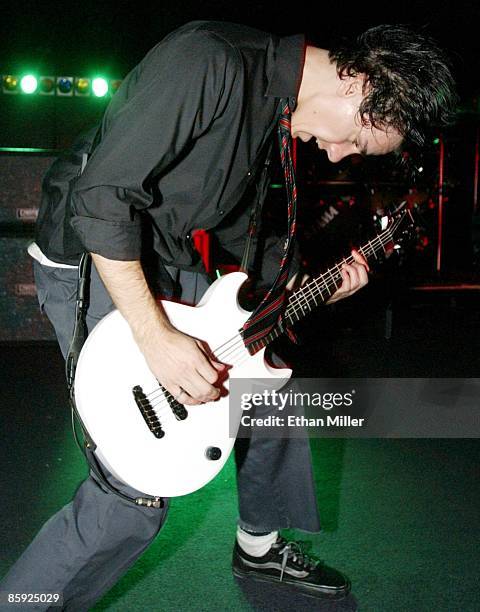 Taproot guitarist Michael DeWolf performs as the band kicks off its tour in support of the upcoming album, "Welcome" at The Castle August 13, 2002 in...